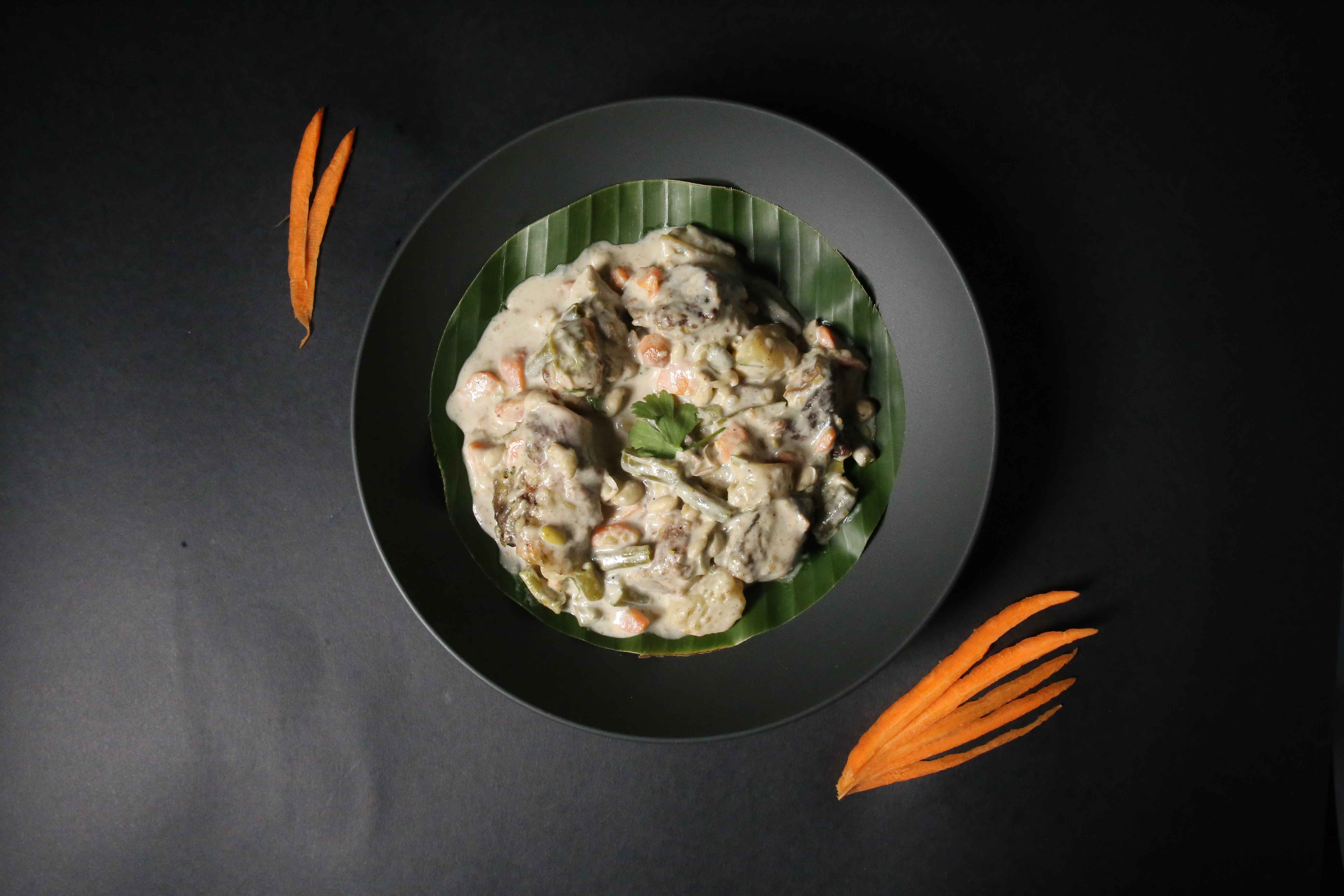 Mutton cooked with mild spices, onions, and potatoes cooked in coconut milk to make a light, comforting curry. Best enjoyed with basmati rice or parotta.